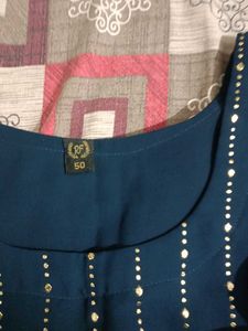 Elegant Teal Kurta Set with Gold Embellishments