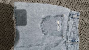 Light Wash Distressed Denim Skirt