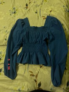 Smocked Peplum Top