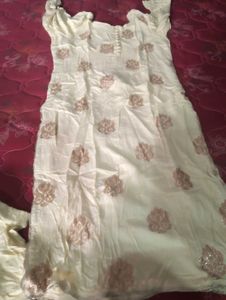 Elegant Cream Embroidered Kurti