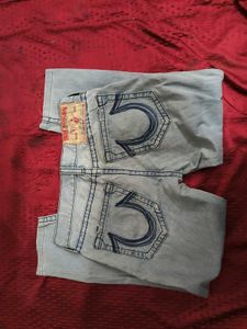 Light Wash Distressed Denim Jeans