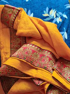 Vibrant Yellow Saree with Red Border