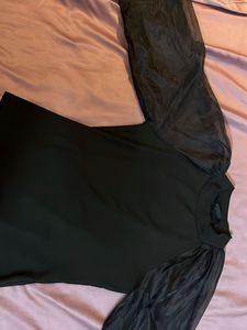 Chic Black Top with Sheer Sleeves