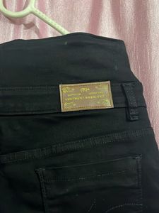 Stylish Black Lace Hem Jeans