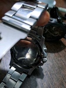 FOSSIL SILVER CHAIN WATCH WITH BLUE DIAL.