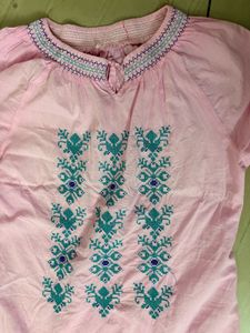 Elegant Pink Kurta with Intricate Embroidery