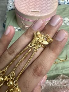 Elegant Gold Hand Bracelet with Dangle Charms