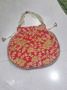 Elegant Cream Jacquard  Saree with potli  purse