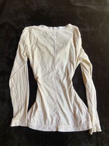 cream ruffled henley fitted top