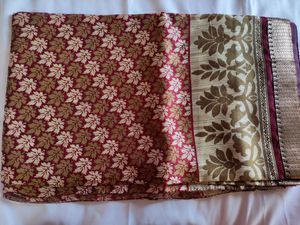 silk and beautiful coloured saree with pure material at cheaper cost. Grab now