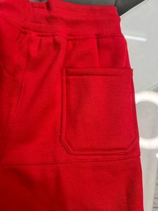 RED CONVERSE LOWER WITH SIDE POCKET