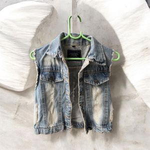Distressed Denim Vest for a Cool Vibe