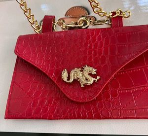 Red Embossed Dragon Clutch