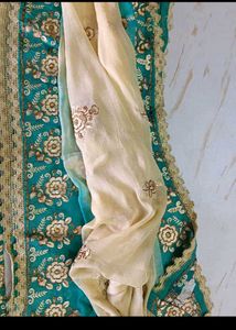 Embroidered unstitched dress material