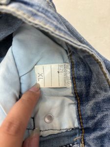Distressed Blue Denim Jeans