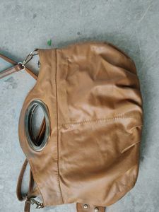 Chic Tan Leather Shoulder Bag with Flower Detail