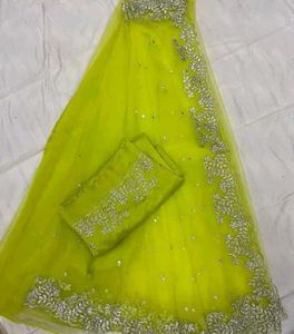 Stunning Yellow Embellished Net Saree