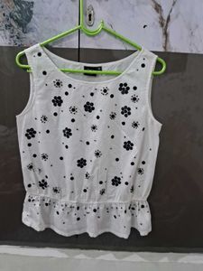 White Sleeveless Top with Floral Print