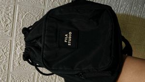 FILA STUDIO Drawstring Sling Bag