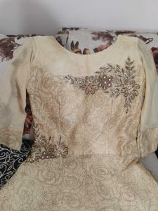 Elegant Beige Embroidered Gown