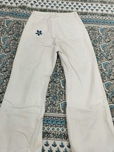 White Flare Jeans with Floral Appliques