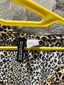 Leopard Print Ruffle Long Sleeve Top