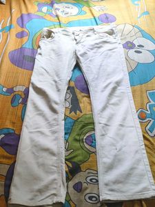 Cream Bell Bottom Jeans