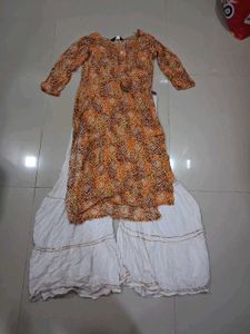 Orange Printed Kurta with White Palazzo Pants