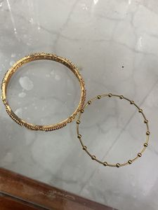 Elegant Gold Bangles with Red Stones
