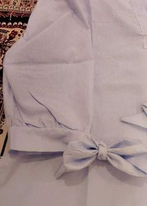 Chic Blue Cotton Top with Bow Sleeves