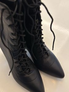 Chic Black Lace-Up Heeled Boots