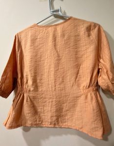 Chic Peach Peplum Top