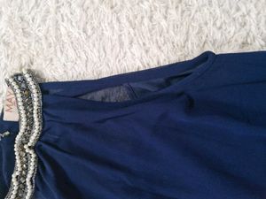 blue tops with stones.