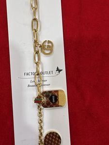 Gold Chain Bracelet with Charms