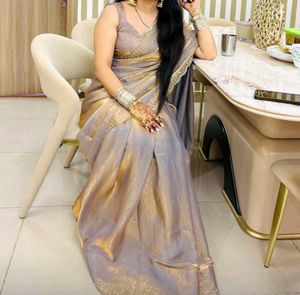 Elegant Beige Saree with Embellished Border