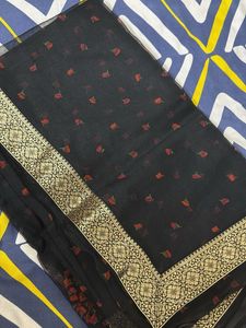 Elegant Black Saree with Floral Motifs