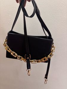 Chic Black Handbag with Gold Chain