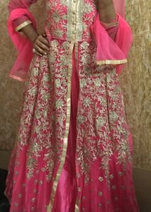 A Beautiful Pinkish Gown With Golden Work