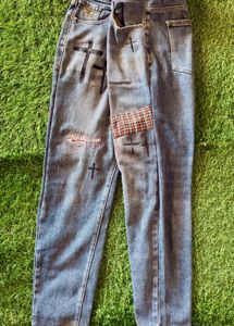 Distressed Blue Jeans with Cross Appliques