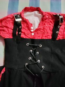 Cute Black Frock With Bright Red Neck Part.