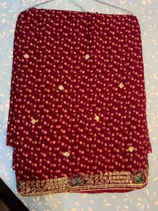 Maroon Bandhani Saree with Gold Border
