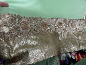 Elegant Mint Green Kurta with Embellished Neckline