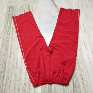 Red Athletic Pants with White Stripes