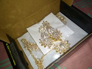 Sukkhi Fabulous Gold Plated AD Necklace Set For Wo