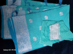 Elegant Teal Saree with Silver Weave