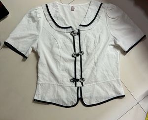 Chic White & Black Trimmed Blouse