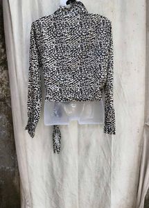 34209. Chic Animal Print Wrap Top