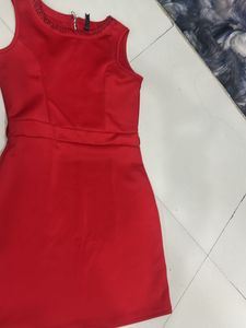 Elegant Red Dress with Embellished Neckline