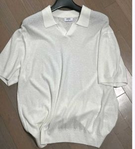 Boucle slit neck knitted polo shirt ivory