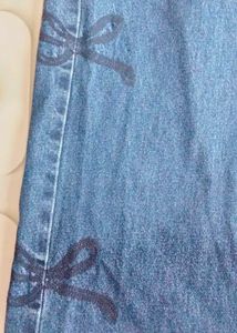 Blue Wide Leg Jeans with Bow Detail